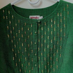 Holiday Glitz: Gold-embellished emerald green tunic, handwoven